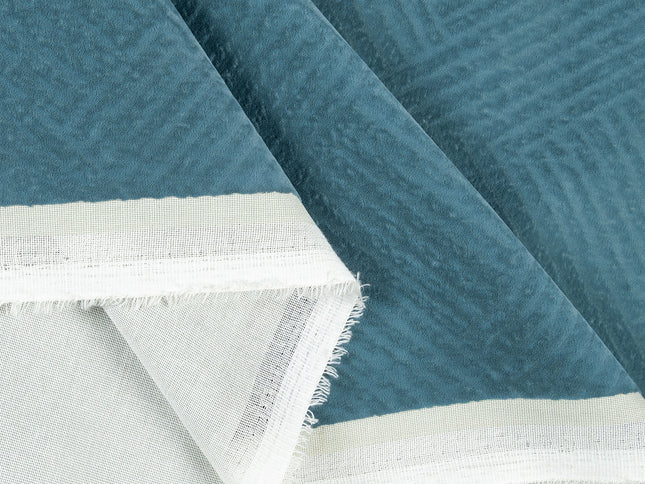 Deep teal colour textured velvet flock geometric pattern sofa, chair and curtain fabrics