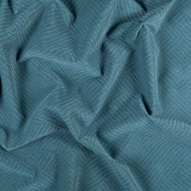 Deep teal colour textured velvet flock geometric pattern sofa, chair and curtain fabrics