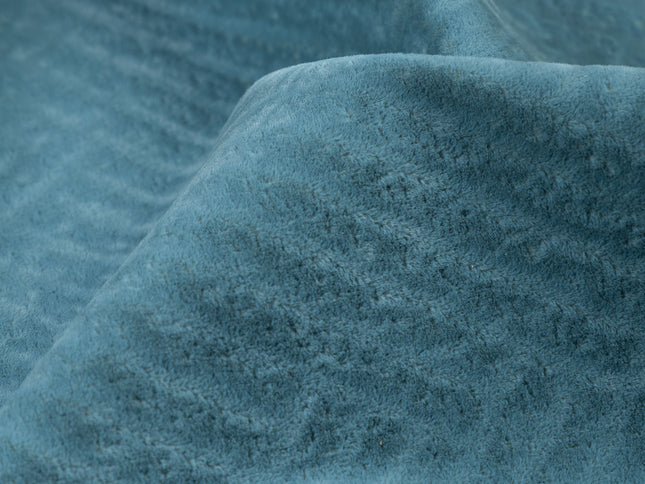 Deep teal colour textured velvet flock geometric pattern sofa, chair and curtain fabrics